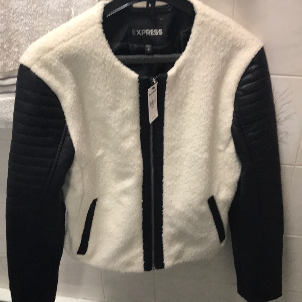 Express Faux Leather jacket with fur and zippers.